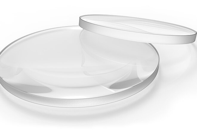 Spherical lenses - Transparent, at least partially spherically curved glass or plastic lenses for the refraction of light